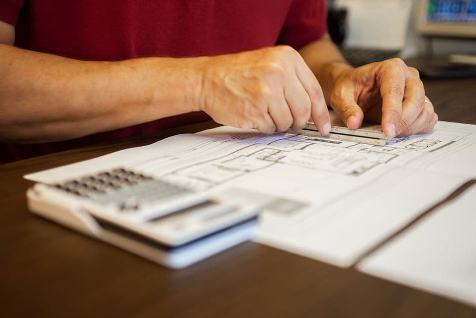 What Parts of the Spec Book Should an Estimator Read Before Pricing a Commercial Bid?